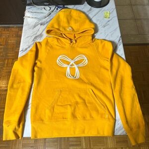 TNA women’s Yellow Hoodie Sz small